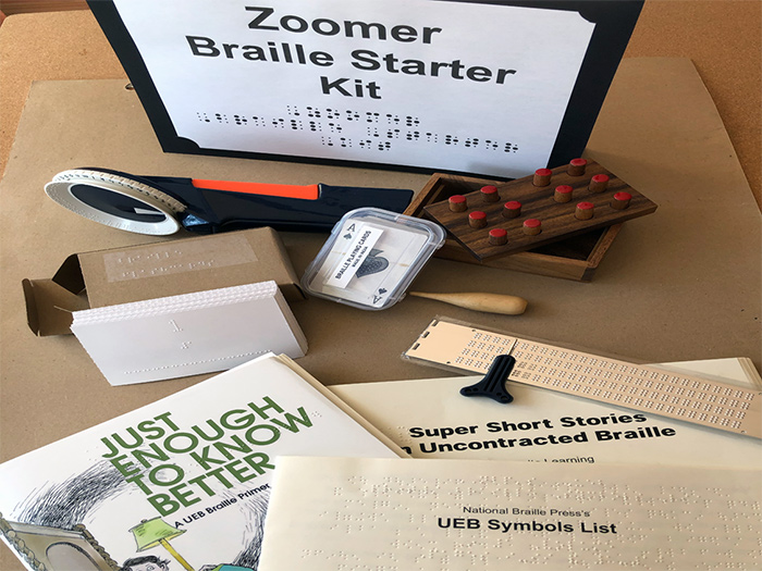 Photograph of all of the items in a complete Braille Zoomers Kit (described in more detail below)